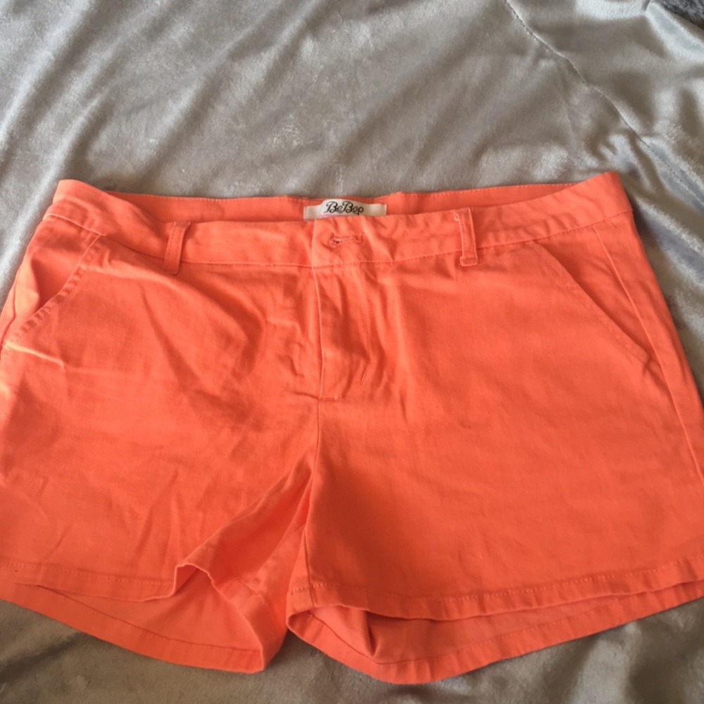Orange coral shorts with pockets